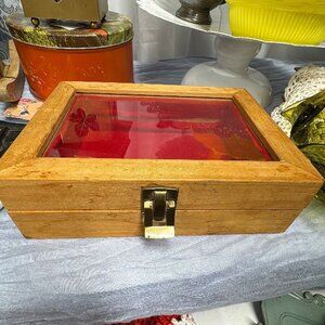 Wooden shadowbox with red lining
